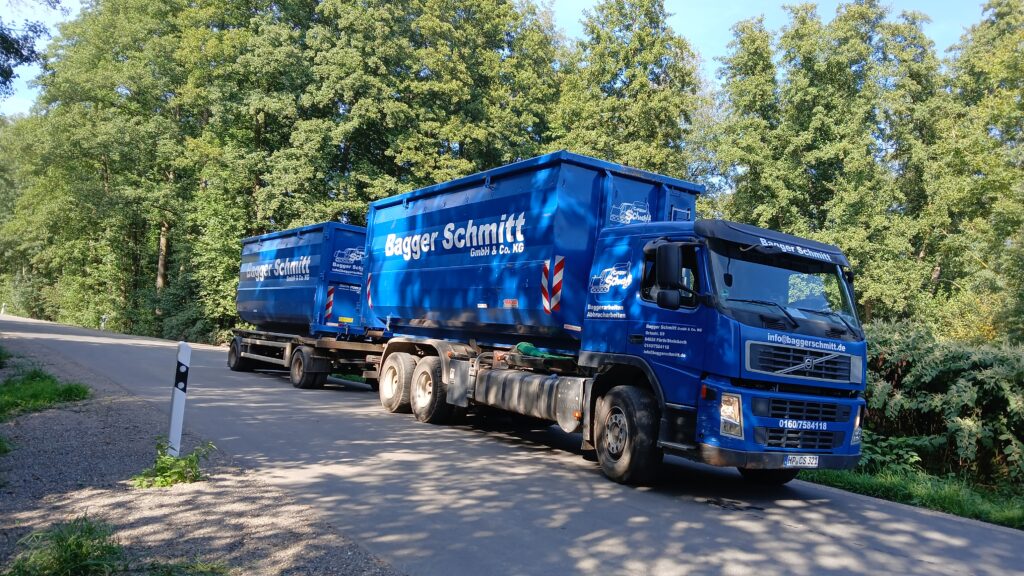 Abrollkipper - Bagger Schmitt